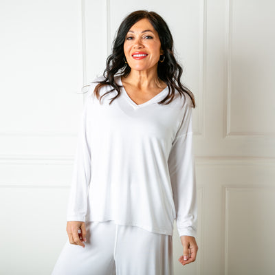 The white Bamboo Long Sleeve Top with a v neckline for a flattering fit